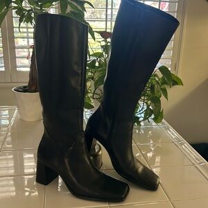 Black tall boots with zipper on the side